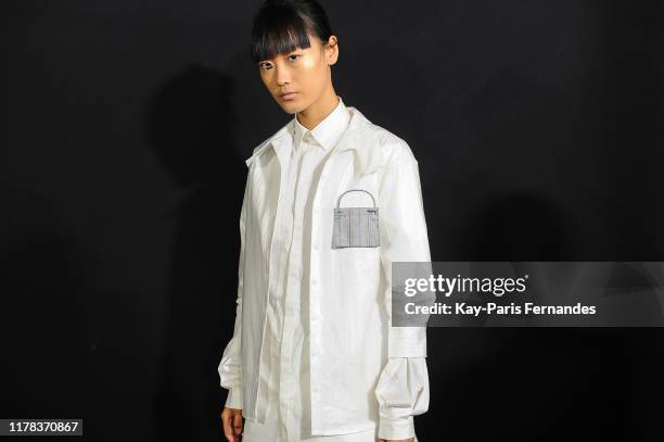 Model poses backstage ahead of the Jarelzhang Womenswear Spring/Summer 2020 show as part of Paris Fashion Week on October 01, 2019 in Paris, France.