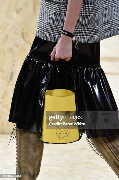 Model, bag detail, walks the runway during the Miu Miu Womenswear Spring/Summer 2020 show as part of Paris Fashion Week on October 01, 2019 in Paris,...