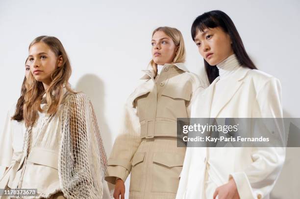 Models pose backstage ahead of the Kristina Fidelskaya Womenswear Spring/Summer 2020 show as part of Paris Fashion Week on September 30, 2019 in...