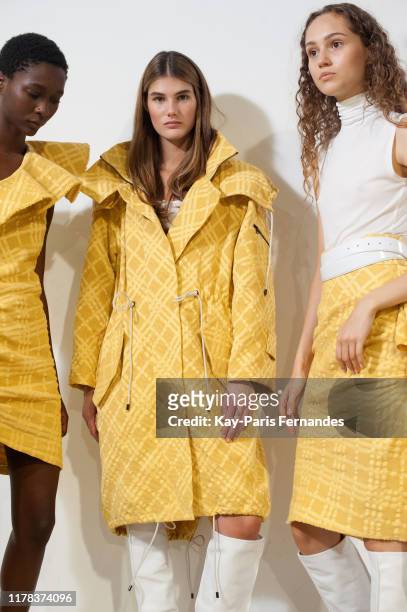 Models pose backstage ahead of the Kristina Fidelskaya Womenswear Spring/Summer 2020 show as part of Paris Fashion Week on September 30, 2019 in...