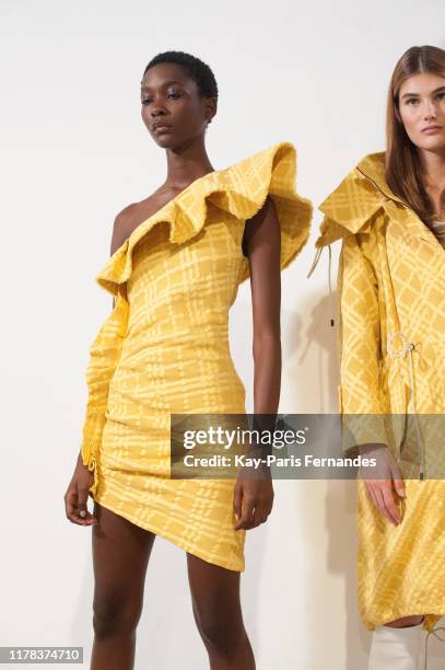 Models pose backstage ahead of the Kristina Fidelskaya Womenswear Spring/Summer 2020 show as part of Paris Fashion Week on September 30, 2019 in...