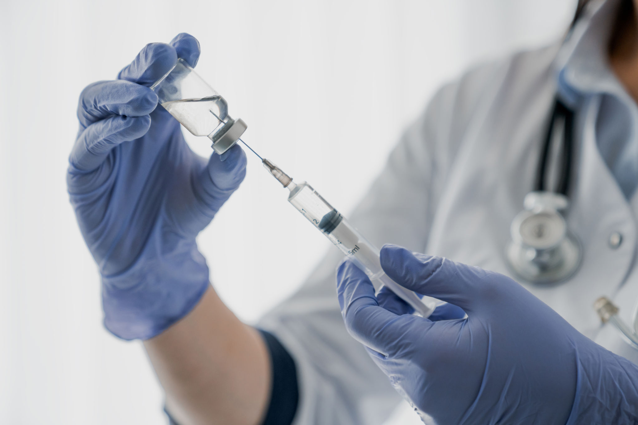 doctor injecting