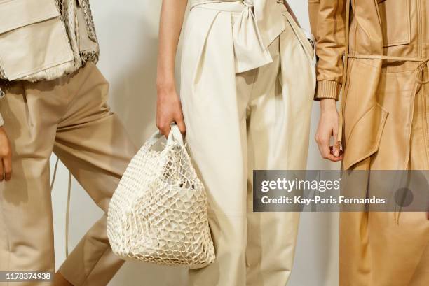 Models pose backstage ahead of the Kristina Fidelskaya Womenswear Spring/Summer 2020 show as part of Paris Fashion Week on September 30, 2019 in...