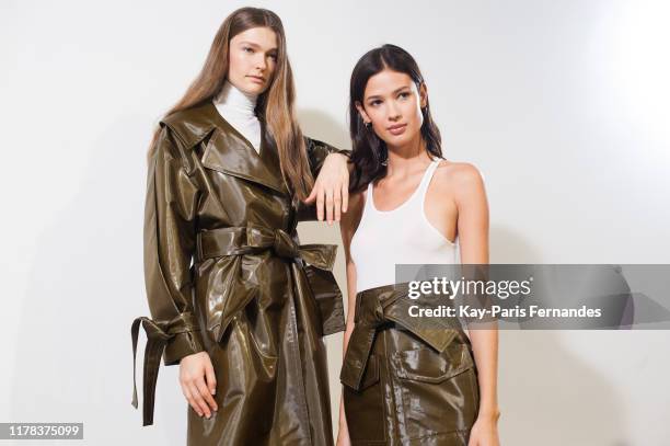 Models pose backstage ahead of the Kristina Fidelskaya Womenswear Spring/Summer 2020 show as part of Paris Fashion Week on September 30, 2019 in...