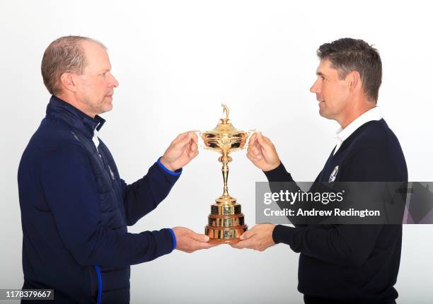 United States Captain Steve Stricker and European Captain Padraig Harrington pose with the Ryder Cup during the Ryder Cup 2020 Year to Go media event...