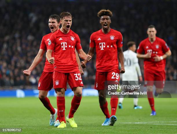 Joshua Kimmich of FC Bayern Munich celebrates with teammates Benjamin Pavard and Kingsley Coman after scoring his team's first goal during the UEFA...