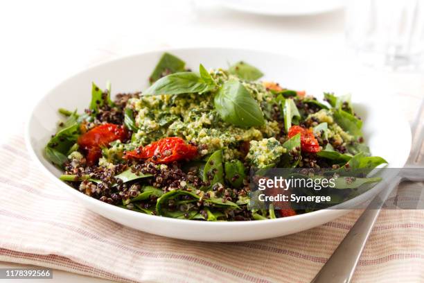 quinoa salad - salad bowl stock pictures, royalty-free photos & images
