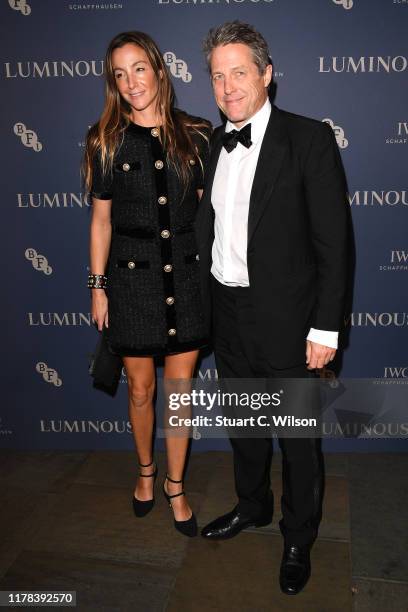 Anna Elisabet Eberstein and Hugh Grant attend the BFI Luminous Fundraising Gala at The Roundhouse on October 01, 2019 in London, England.
