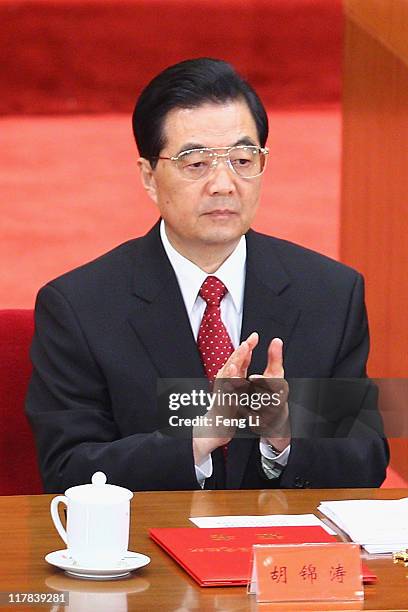 Chinese President Hu Jintao attends the celebration of the Communist Party's 90th anniversary at the Great Hall of the People on July 1, 2011 in...