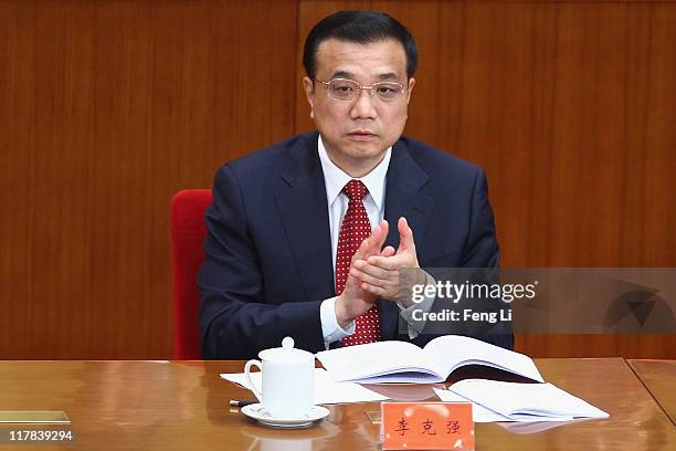 Chinese Vice Premier Li Keqiang attends the celebration of the Communist Party's 90th anniversary at the Great Hall of the People on July 1, 2011 in...