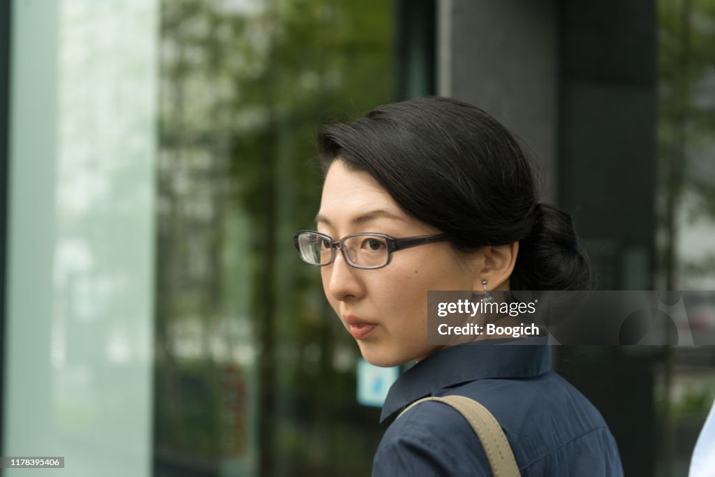 Portrait of a Professional Japanese Woman Working in an Office
