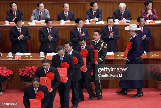 Chinese leaders award medals for the outstanding Communists during the celebration of the Communist Party's 90th anniversary at the Great Hall of the...