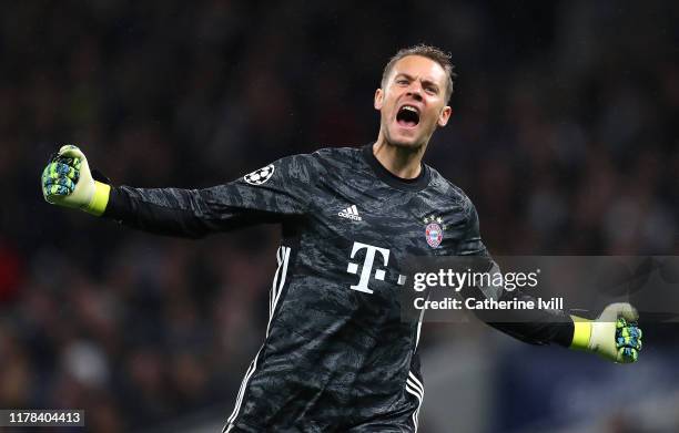 Manuel Neuer of FC Bayern Munich celebrates his team's third goal during the UEFA Champions League group B match between Tottenham Hotspur and Bayern...