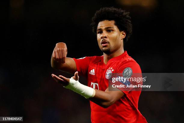 Serge Gnabry of FC Bayern Munich celebrates after scoring his team's third goal during the UEFA Champions League group B match between Tottenham...