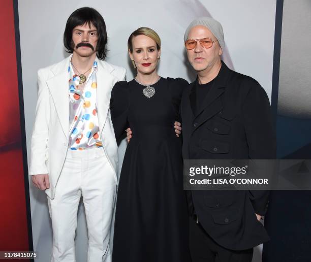 Actor Evan Peters, Sarah Paulson and and Ryan Murphy arrive for the Red Carpet event celebrating 100 episodes of FX's "American Horror Story" at the...