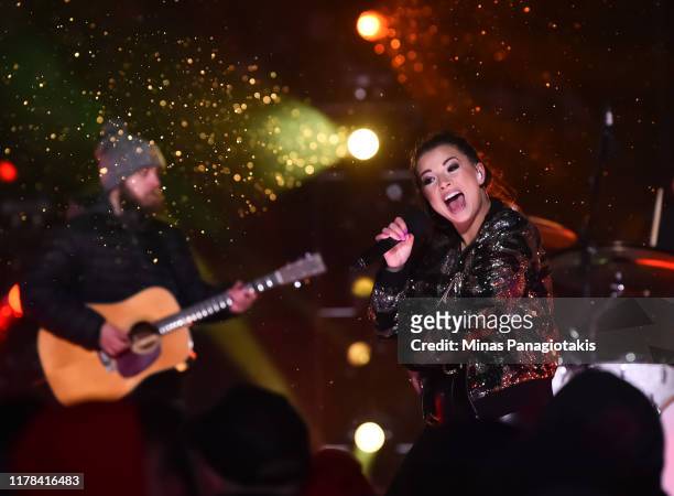 Jess Moskaluke performs during the second intermission as the Calgary Flames take on the Winnipeg Jets during the 2019 Tim Hortons NHL Heritage...