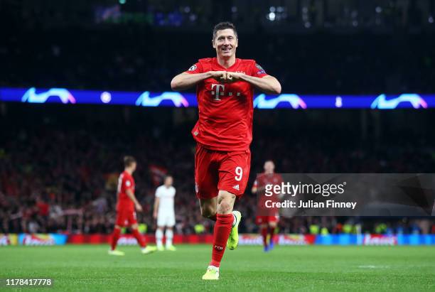 Robert Lewandowski of FC Bayern Munich celebrates after scoring his team's sixth goal during the UEFA Champions League group B match between...