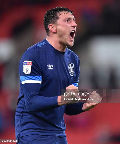 Tommy Elphick of Huddersfield reacts during the Sky Bet Championship match between Stoke City and Huddersfield Town at Bet365 Stadium on October 01,...