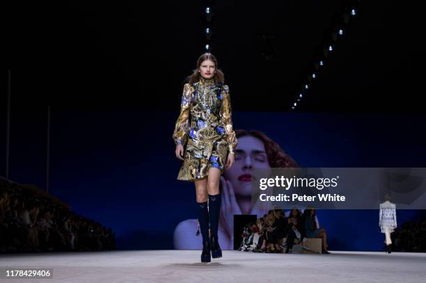 Signe Veiteberg walks the runway during the Louis Vuitton