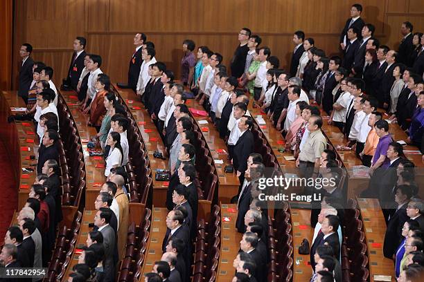 The members of the Communist Party of China attend the celebration of the Communist Party's 90th anniversary at the Great Hall of the People on July...