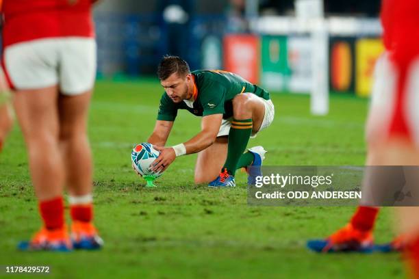 South Africa's fly-half Handre Pollard lines up a penalty during the Japan 2019 Rugby World Cup semi-final match between Wales and South Africa at...