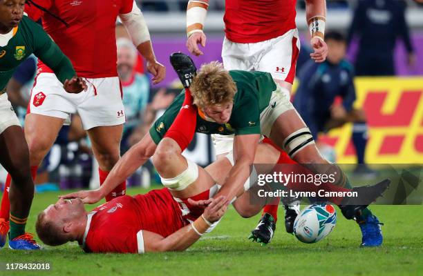 Pieter-Steph Du Toit of South Africa and Ross Moriarty of Wales during the Rugby World Cup 2019 Semi-Final match between Wales and South Africa at...