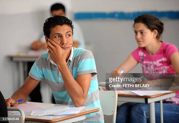 Tunisian students prepare to take the baccalaureat exam on June 9, 2011 in Tunis. Yesterday Tunisian Prime Minister Beji Caid Essebsi announced that...