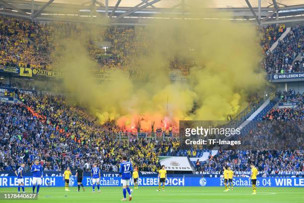 Supporters of Borussia Dortmund are seen during the Bundesliga match between FC Schalke 04 and Borussia Dortmund at Veltins-Arena on October 26, 2019...