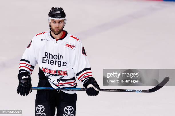 Jakub Kindl of Koelner Haie looks on during the DEL match between EHC Red Bull Muenchen and Koelner Haie at Olympiaeishalle Muenchen on October 25,...
