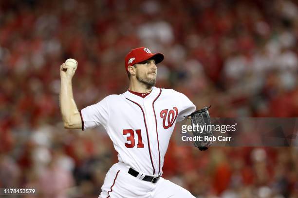 Max Scherzer of the Washington Nationals throws a pitch against the Milwaukee Brewers during the first inning in the National League Wild Card game...