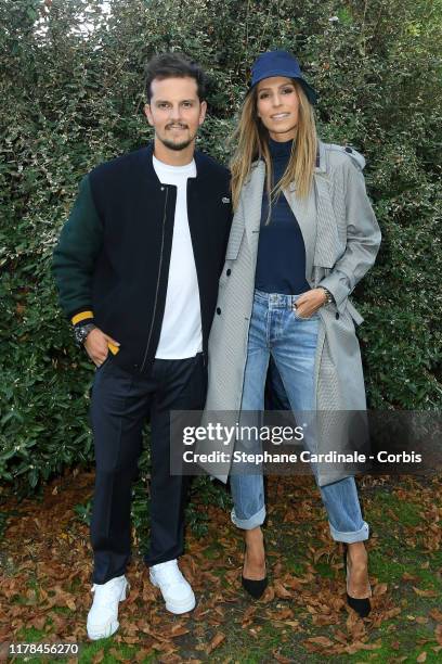 Juan Arbelaez and Laury Thilleman attend the Lacoste Womenswear Spring/Summer 2020 show as part of Paris Fashion Week on October 01, 2019 in Paris,...