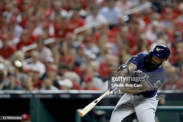 Eric Thames of the Milwaukee Brewers celebrates hits a home run against Max Scherzer of the Washington Nationals during the second inning in the...
