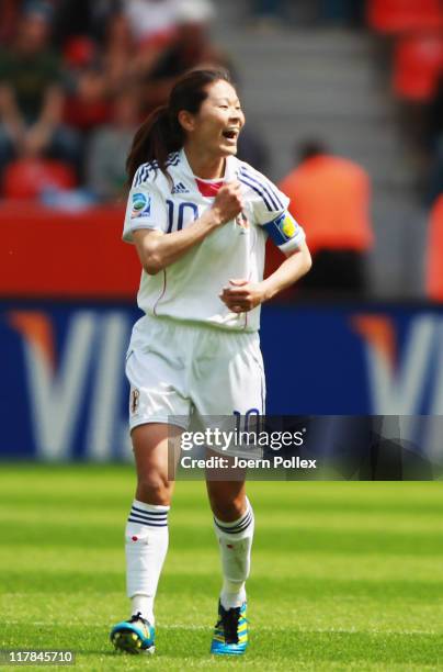 Homare Sawa of Japan celebrates after scoring her team'S first goal during the FIFA Women's World Cup 2011 Group B match between Japan and Mexico at...