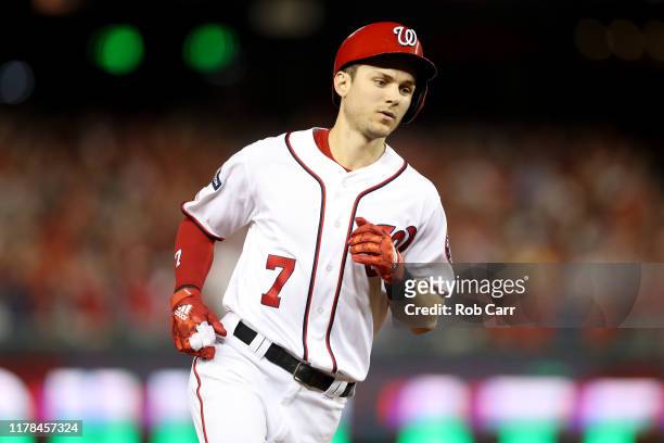 Trea Turner of the Washington Nationals celebrates after hitting a two run home run against Brandon Woodruff of the Milwaukee Brewers during the...