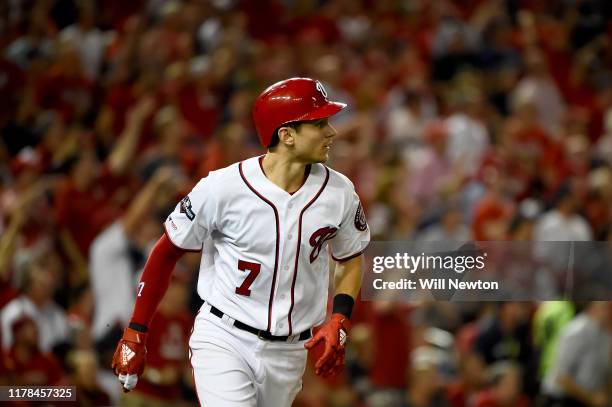 Trea Turner of the Washington Nationals celebrates after hitting a two run home run against Brandon Woodruff of the Milwaukee Brewers during the...