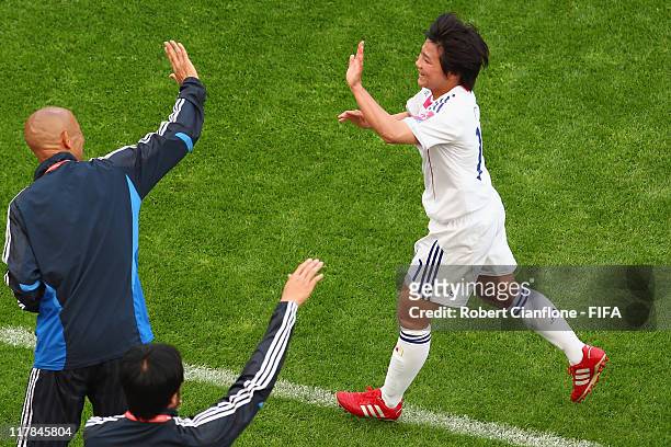Shinobu Ohno of Japan celebrates her goal during the FIFA Women's World Cup 2011 Group B match between Japan and Mexico at the BayArena on July 1,...