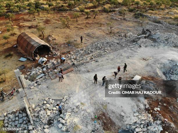 An aerial view taken on October 27, 2019 shows the site that was hit by helicopter gunfire which reportedly killed nine people near the northwestern...