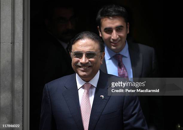 Bilawal Bhutto follows his father President Zardari of Pakistan from Downing Street after talks with British Prime Minister David Cameron on July 1,...