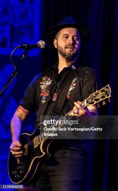 Alt-Country and -Rock musician Derek Cruz plays guitar with Alejandro Escovedo's band at the Iridium nightclub, New York, New York, August 27, 2019.