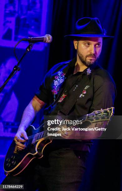 Alt-Country and -Rock musician Derek Cruz plays guitar with Alejandro Escovedo's band at the Iridium nightclub, New York, New York, August 27, 2019.