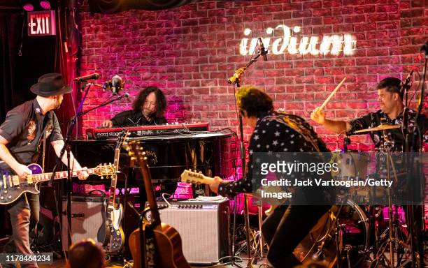 American Alt-Country and -Rock musician Alejandro Escovedo plays guitar with his band at the Iridium nightclub, New York, New York, August 27, 2019....