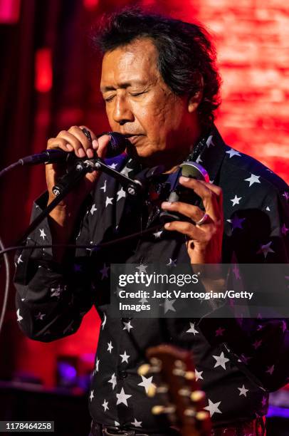 American Alt-Country and -Rock musician Alejandro Escovedo performs with his band at the Iridium nightclub, New York, New York, August 27, 2019.
