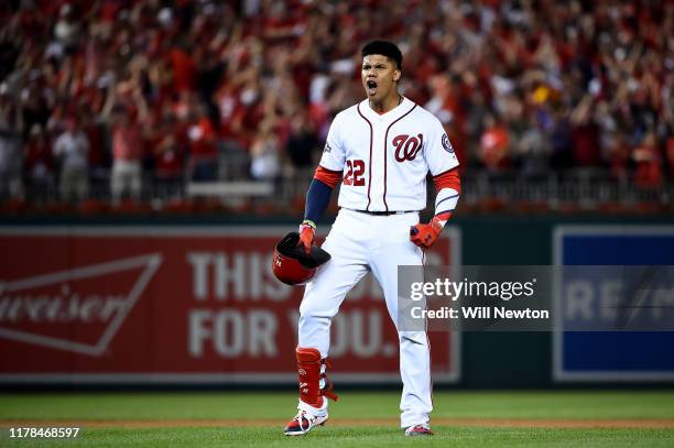 Juan Soto of the Washington Nationals celebrates after hitting a single to right field to score 3 runs off of an error by Trent Grisham of the...