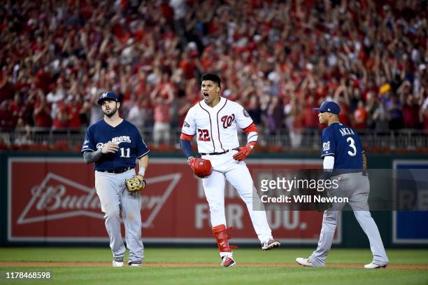 Juan Soto of the Washington Nationals celebrates after hitting a single to right field to score 3 runs off of an error by Trent Grisham of the...