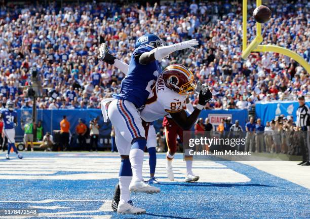 Jabrill Peppers of the New York Giants breaks up a pass in the end zone against Jeremy Sprinkle of the Washington Redskins at MetLife Stadium on...