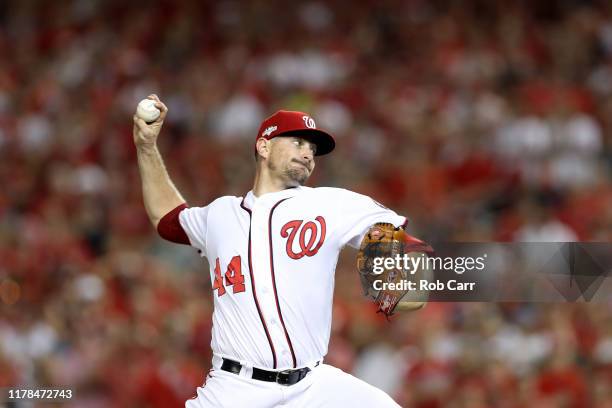 Daniel Hudson of the Washington Nationals throws a pitch against the Milwaukee Brewers during the ninth inning in the National League Wild Card game...