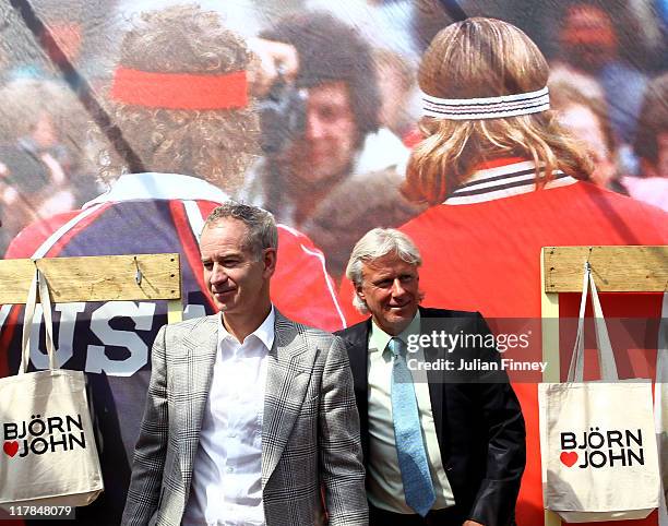 Wimbledon tennis legends John McEnroe and Bjorn Borg attend a photocall at Wimbledon Park on July 1, 2011 in Wimbledon, England. Borg and McEnroe...