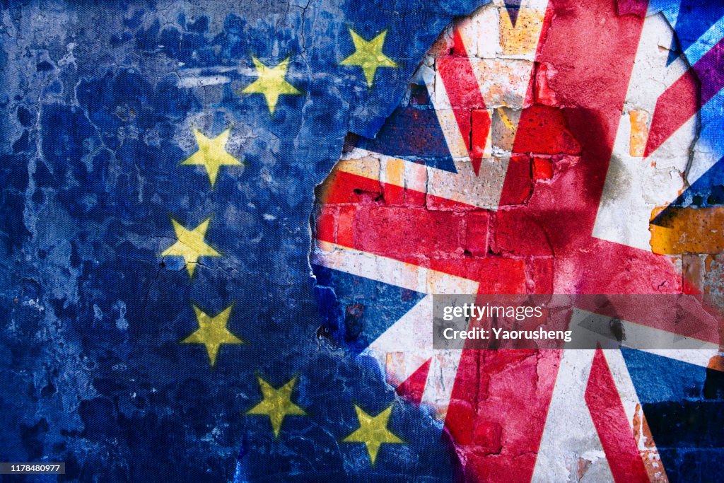 Brexit, Flags Of The United Kingdom And The European Union On Cracked Background