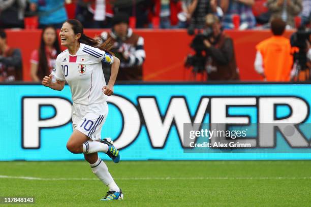 Homare Sawa of Japan celebrates her team's fourth goal during the FIFA Women's World Cup 2011 Group B match between Japan and Mexico at the Fifa...