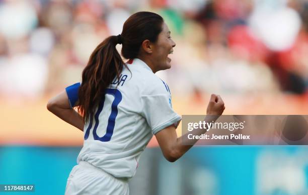 Homare Sawa of Japan celebrates after scoring her team's fourth goal during the FIFA Women's World Cup 2011 Group B match between Japan and Mexico at...